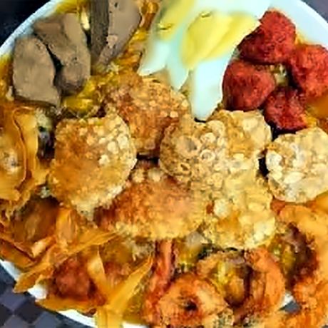 Lomi with toppings