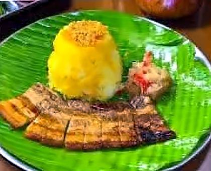 Liempo with java rice on banana leaf
